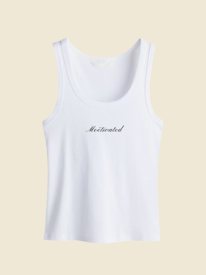 White tank top with 'Motivated' text on a light background