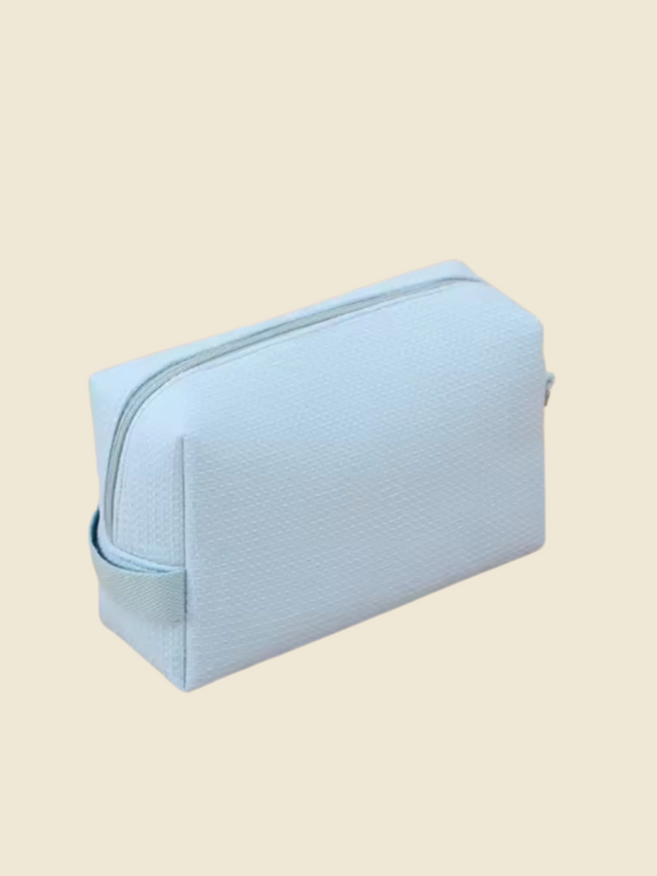 The Monogram Makeup Bag