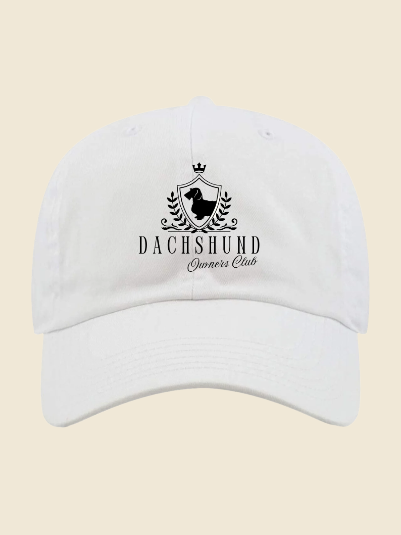 white cap with dachshund crest in black
