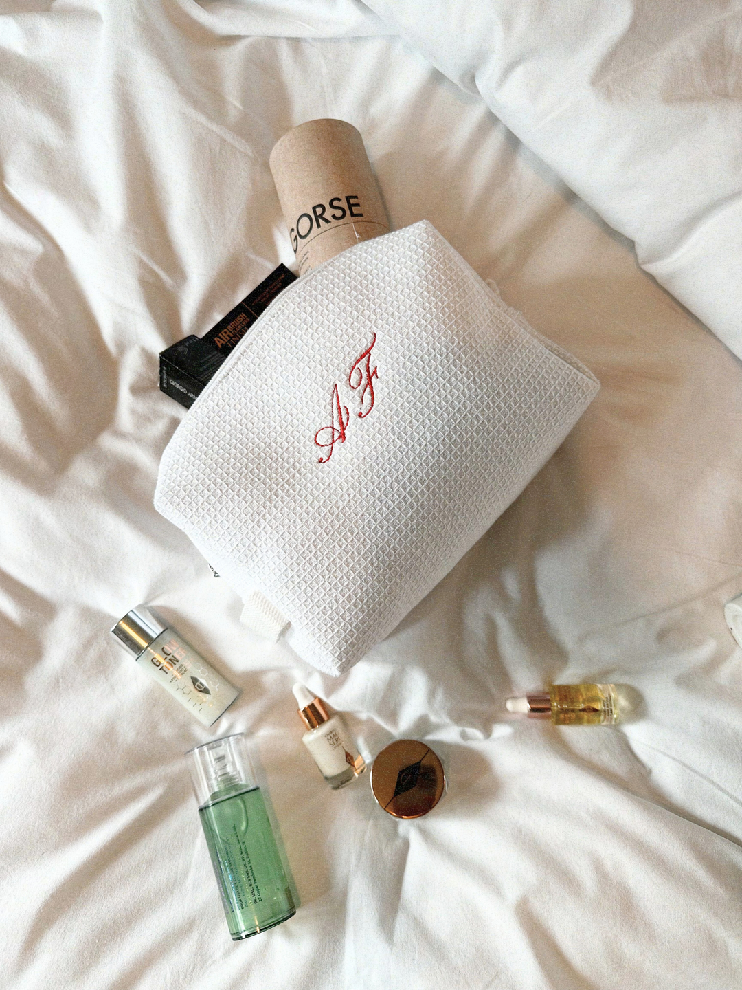 The Monogram Makeup Bag